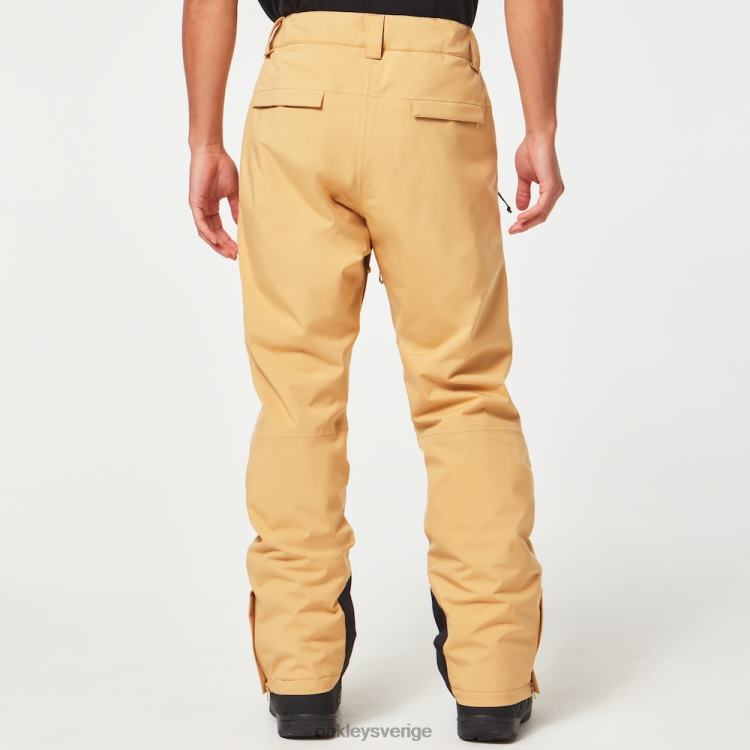 Oakley axelisolerad byxa T8RX02804 lätt curry